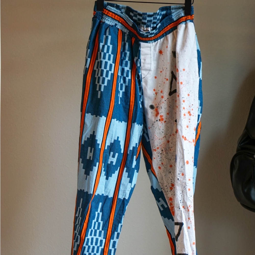 Vibrant Blue and White Pants with Orange Accents